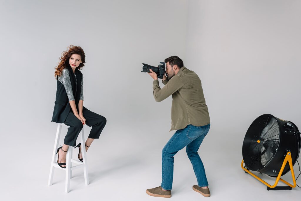 professional-photographer-and-attractive-model-on-2023-11-27-05-14-41-utc