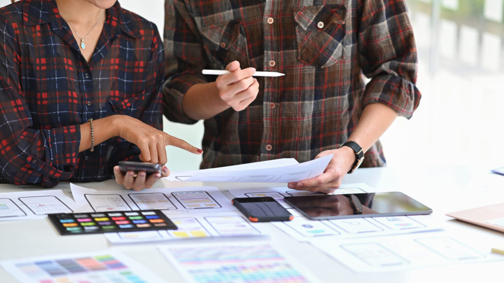 team-of-ux-designer-designing-a-wireframe-applicat-2023-11-27-05-15-32-utc