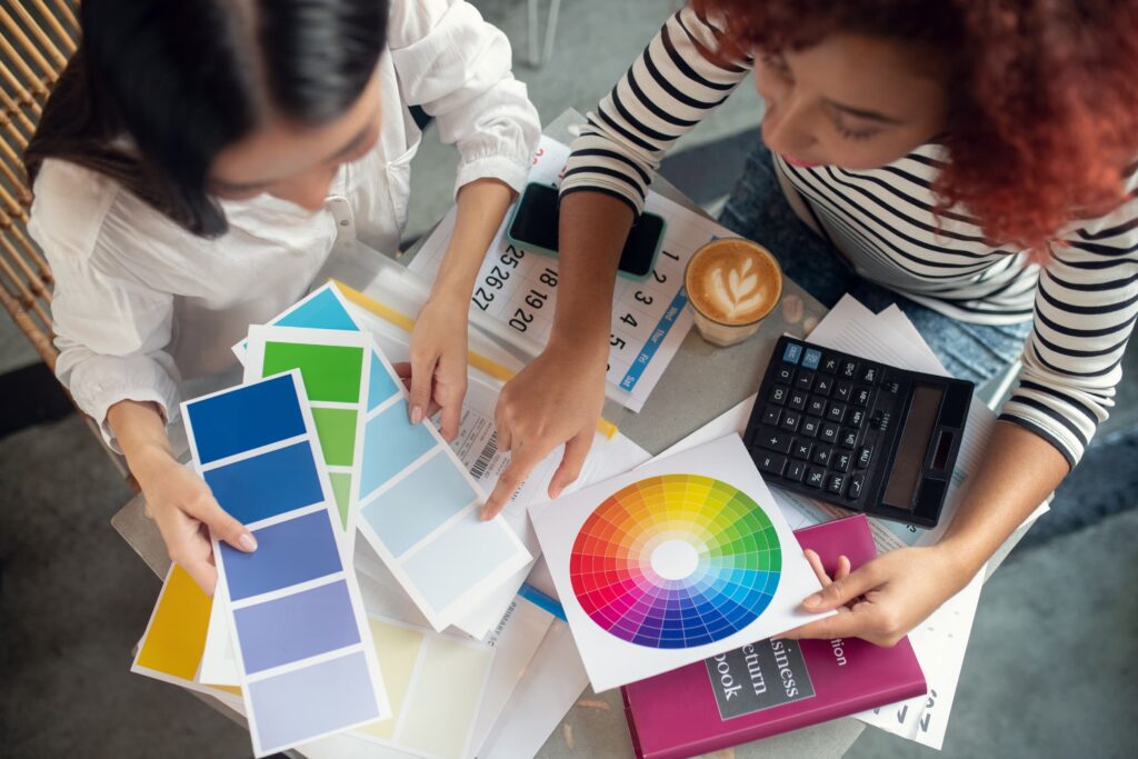top-view-of-designers-looking-at-color-palette-2023-11-27-05-23-33-utc